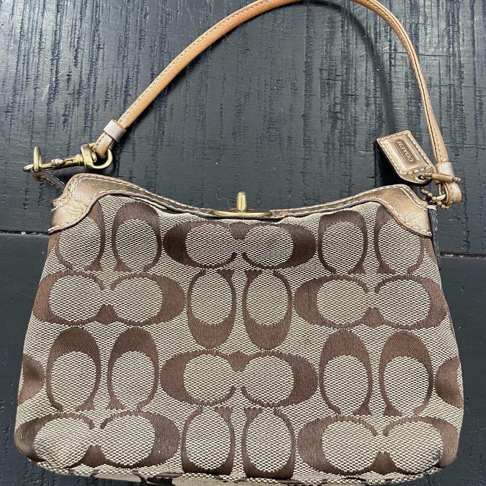 Coach Brown and Tan Signature Clutch